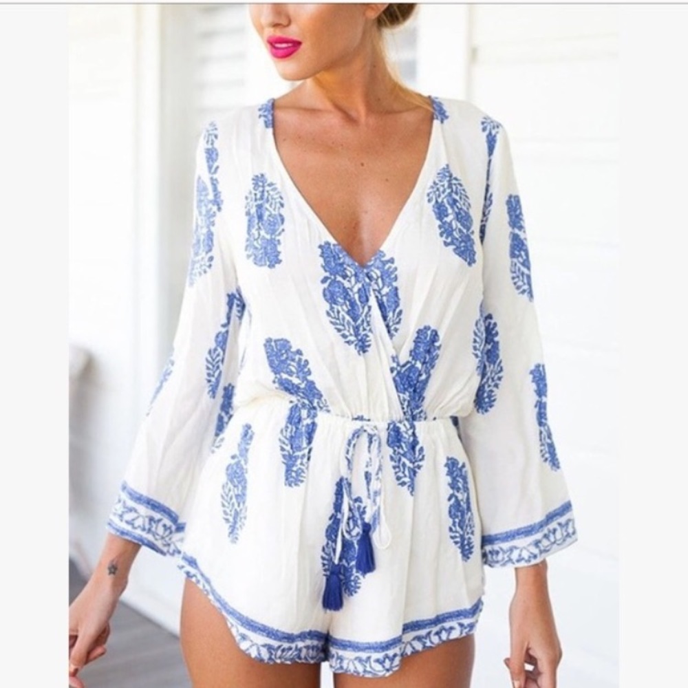 Bell sleeved blue and white romper.