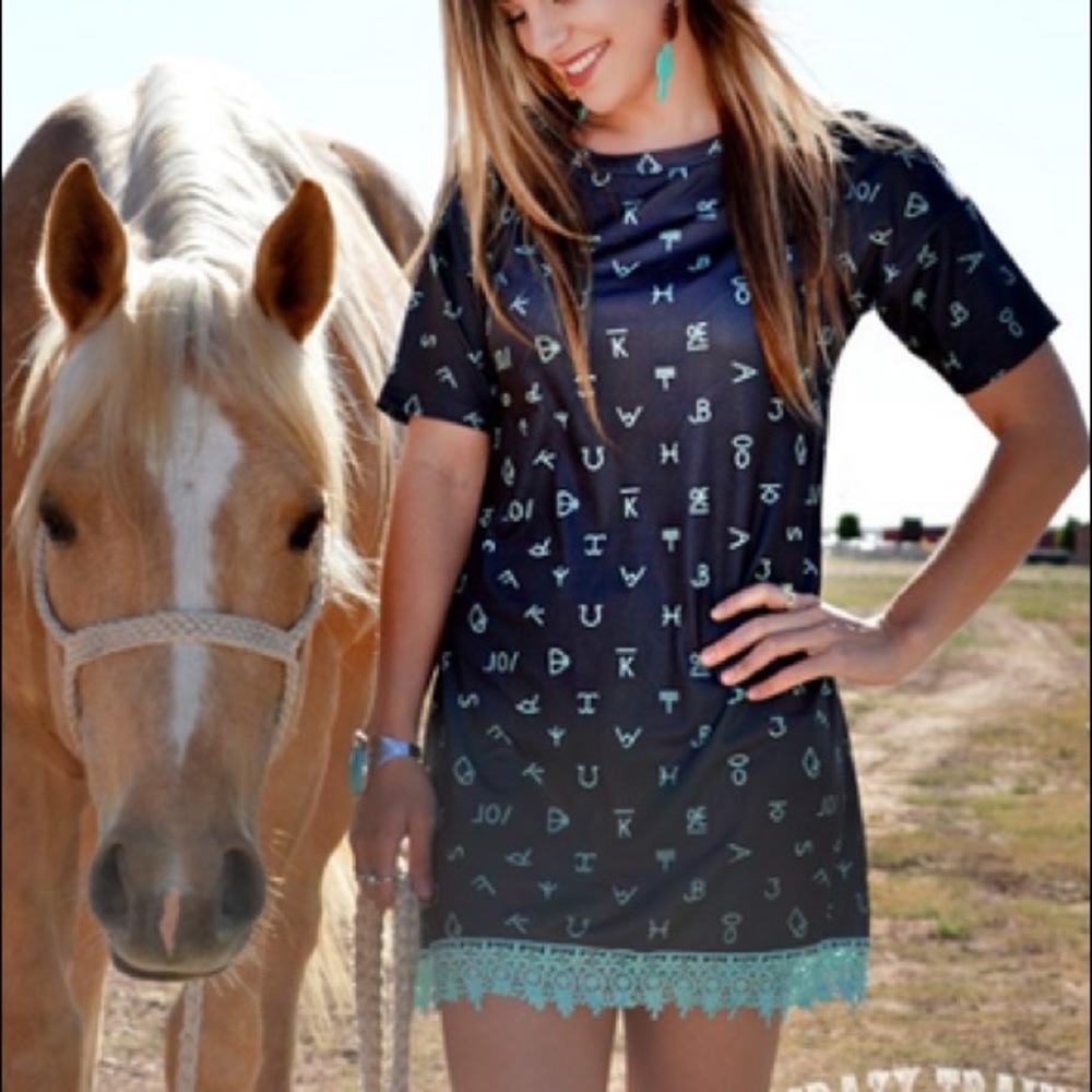 Crazy Train brand crochet hem tunic