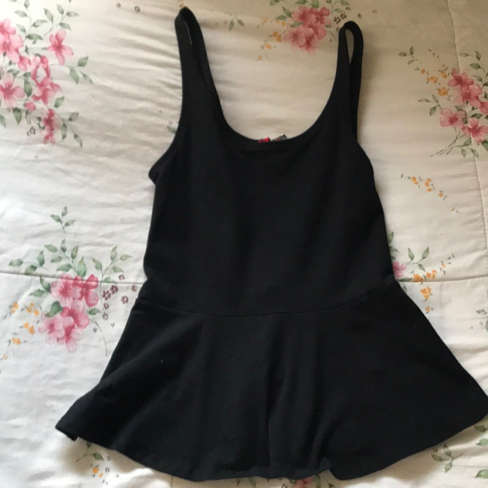 Peplum sleeveless top