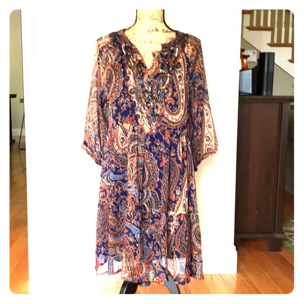 Detailed, multi-colored pattern tunic dress.