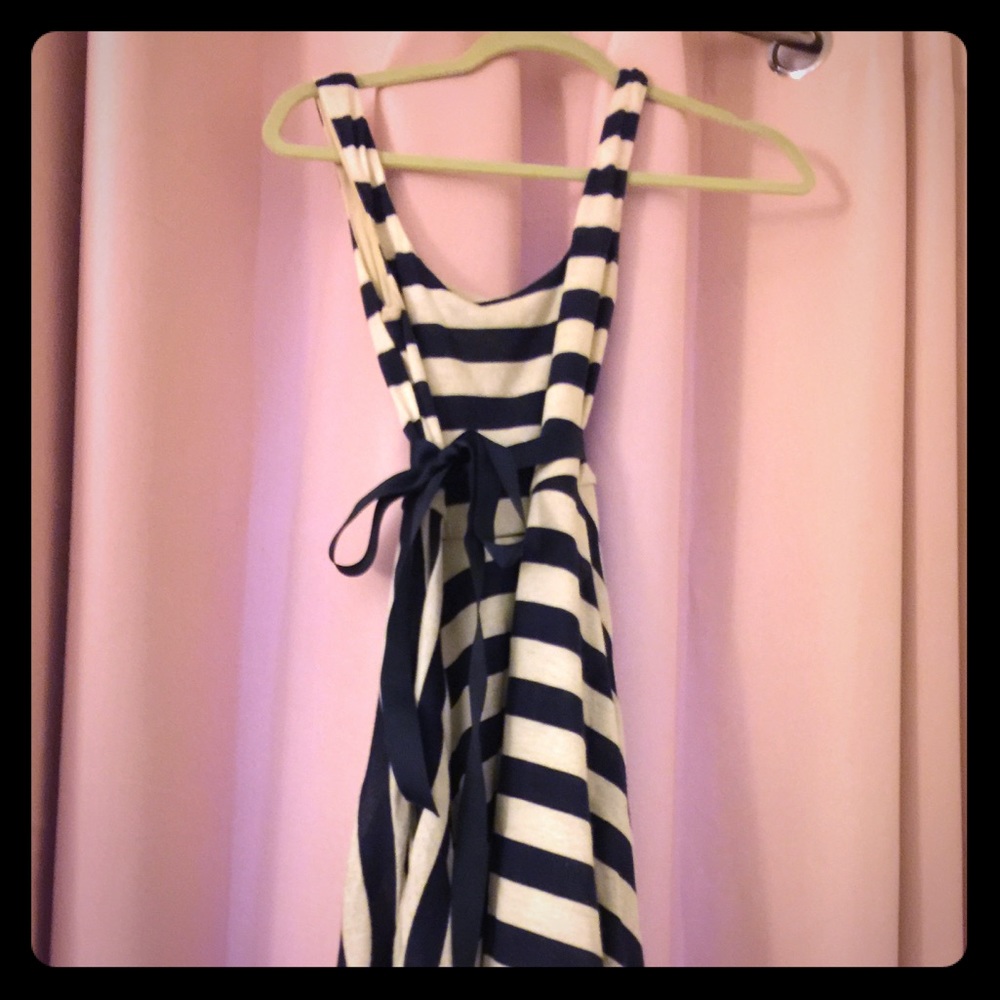 White and Navy striped dress with navy tie.