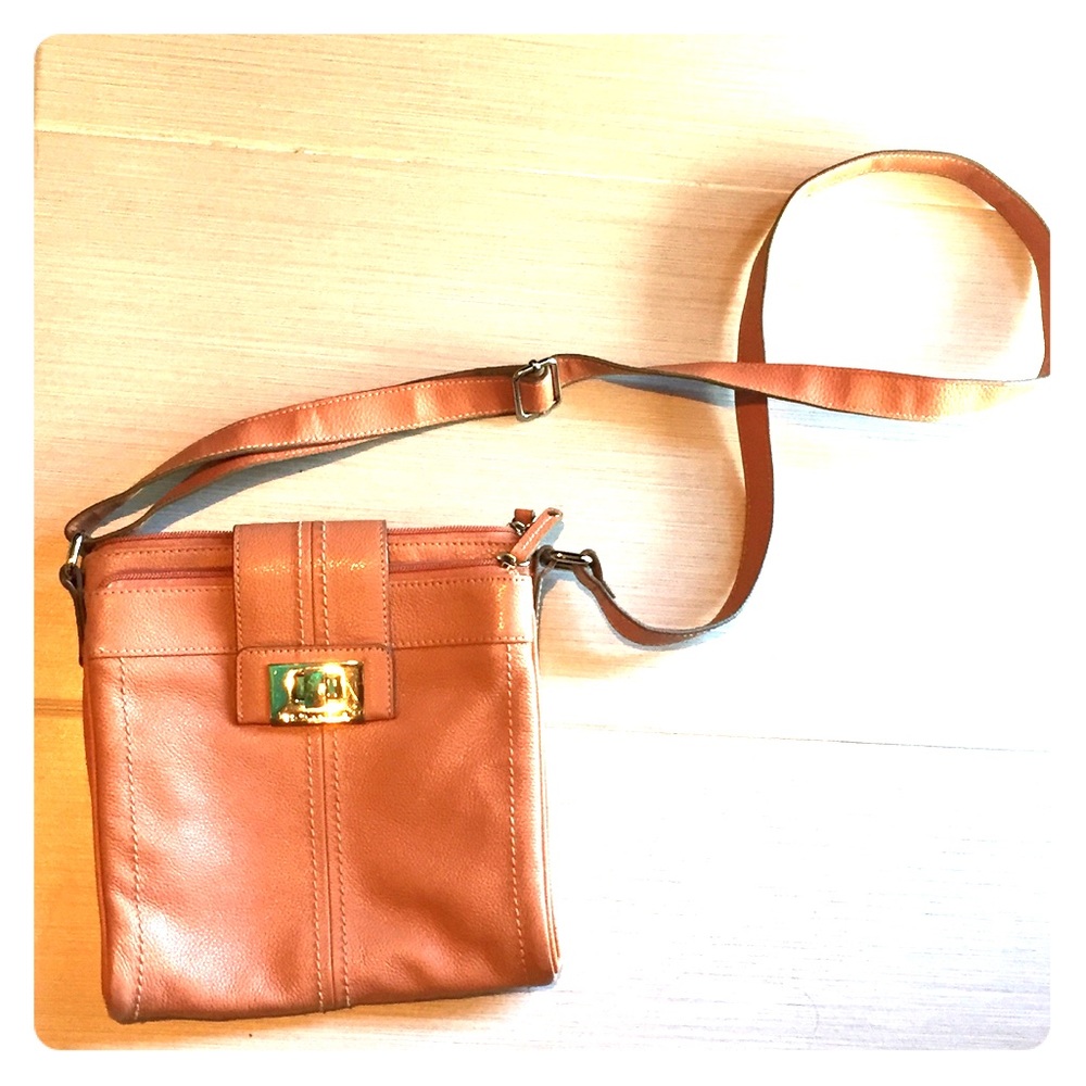 Used Tignanello purse. Peach color.