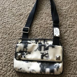 L.A.M.B. designer crossbody bag. Black and beige