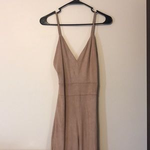 Nude full length form fitting jumpsuit