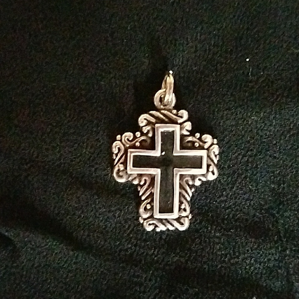 Silver 92.5 and black ornate cross pendant.