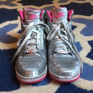 Metallic silver Nike high-tops