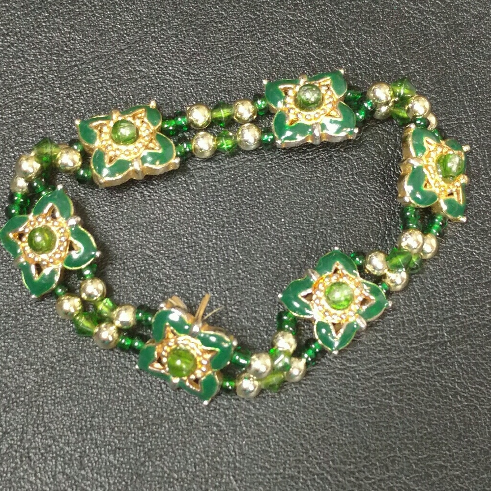 Stretch bracelet w enameled metal & plastic beads