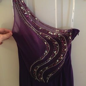 Long purple beaded prom dress