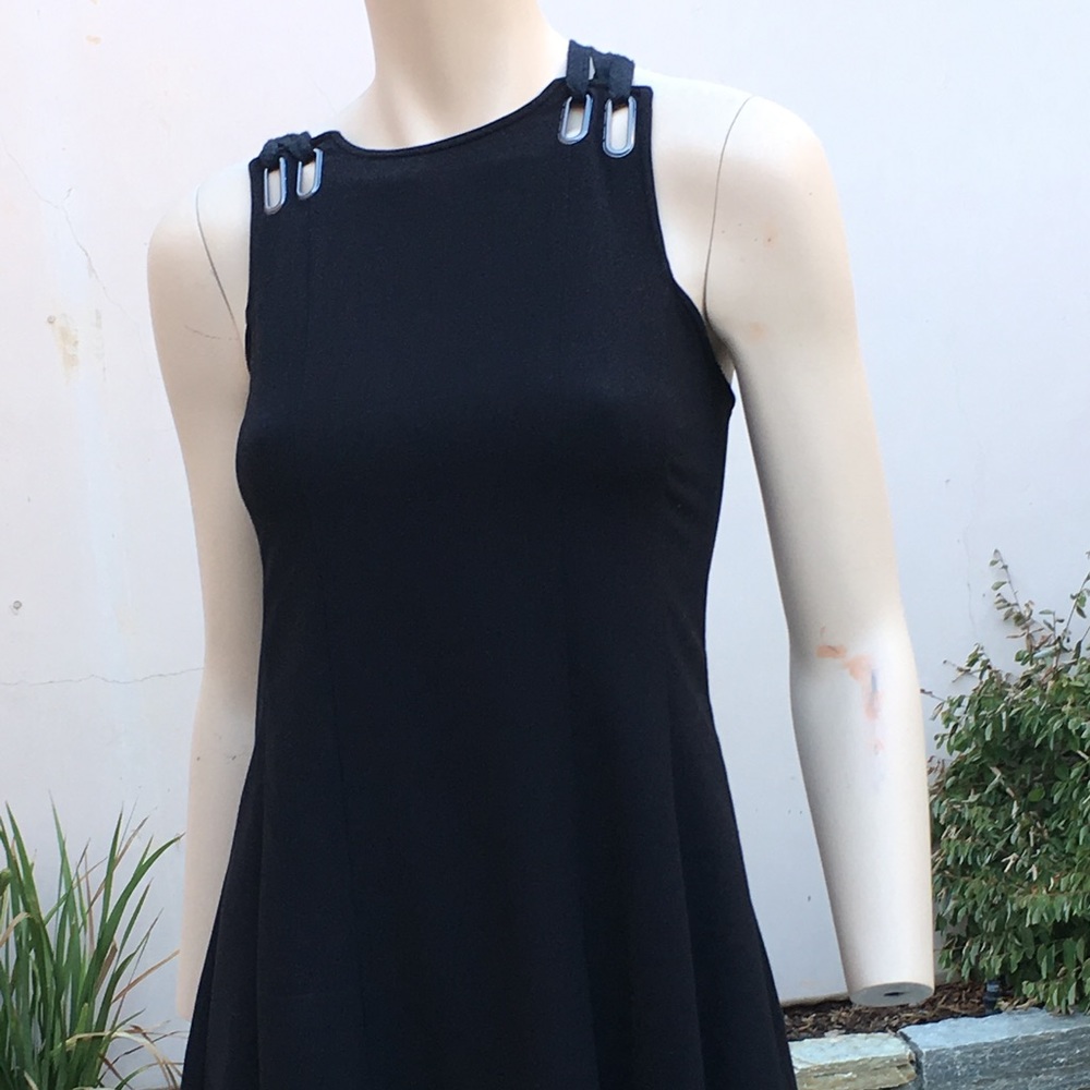 Free People Mini Dress.  Gun metal detail at top.