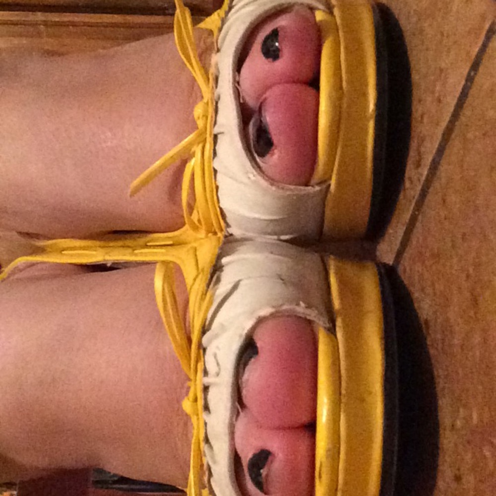 Yellow and white corset back platforms by Pulse