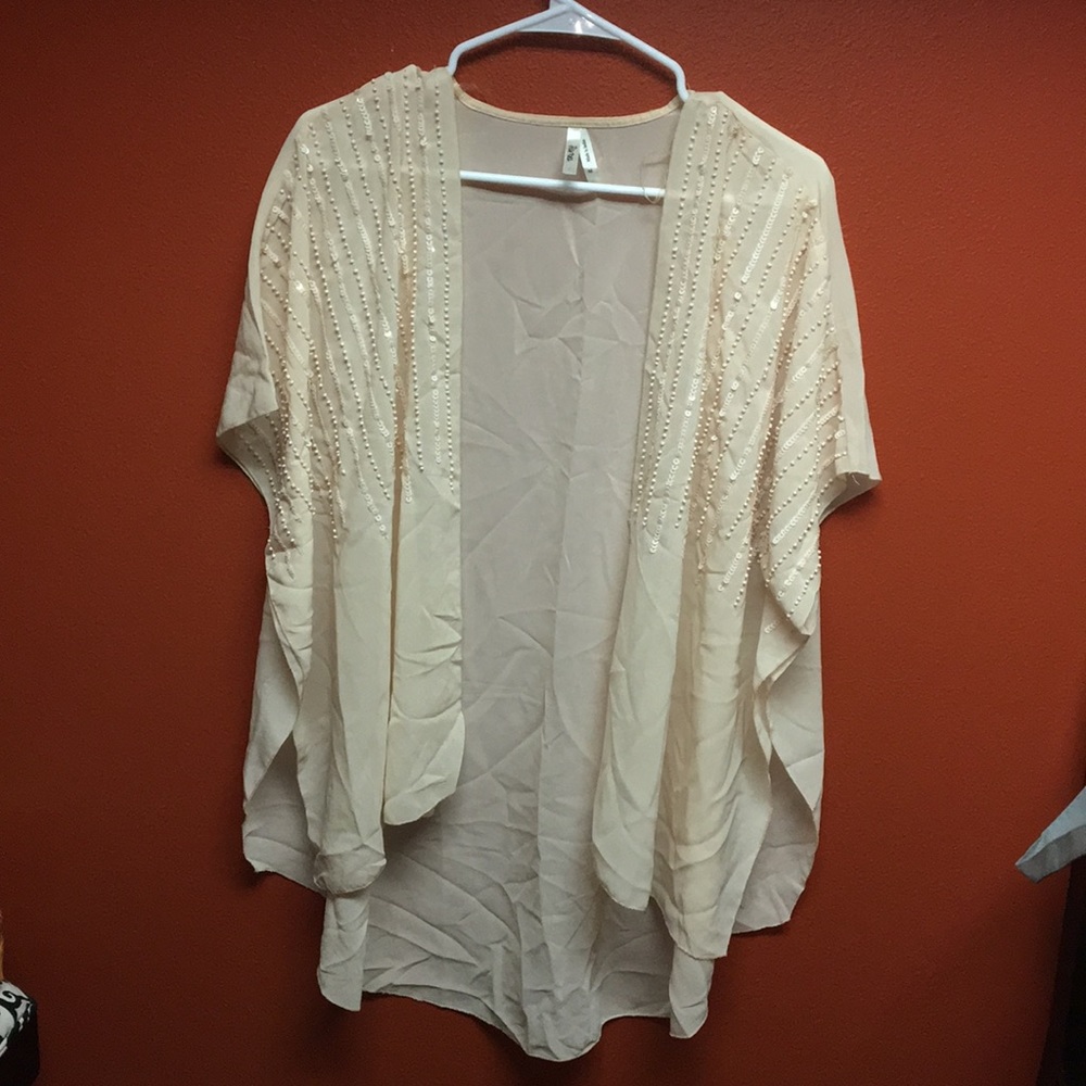 Cream cover-up shawl