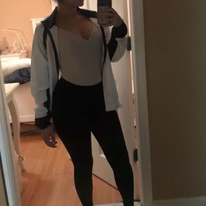 White and black windbreaker