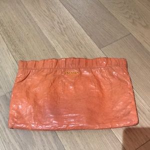 Prada orange clutch