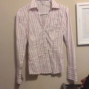 Small form-fitting pink/white striped blouse