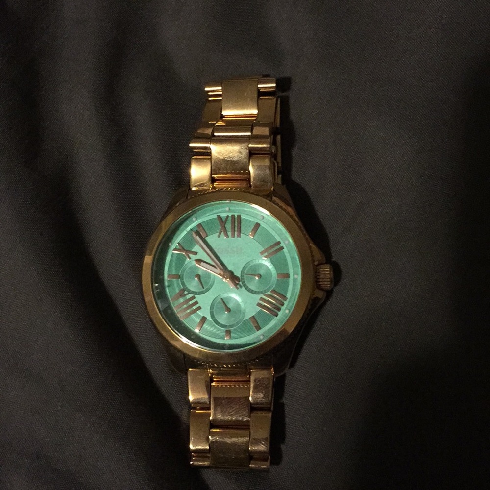Gold fossil watch