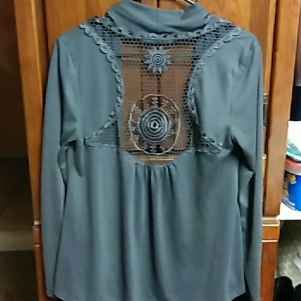 Open cardigan with see threw embroidery on back