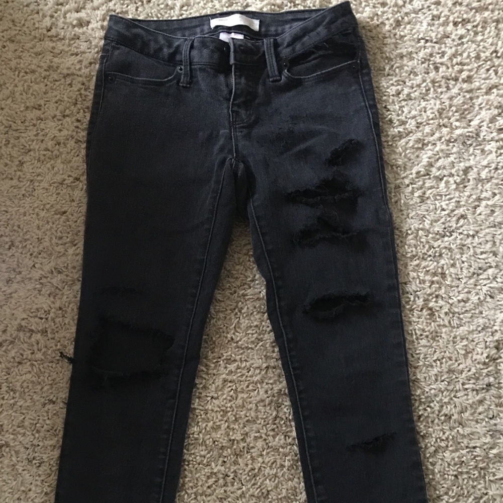 black ripped jeans