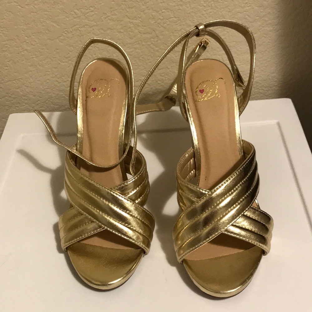 Gold high straps heel