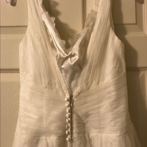 Never worn wedding dress size 8, tags still attach