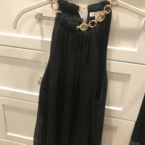 Sexy black top with gold chain necklace attached.