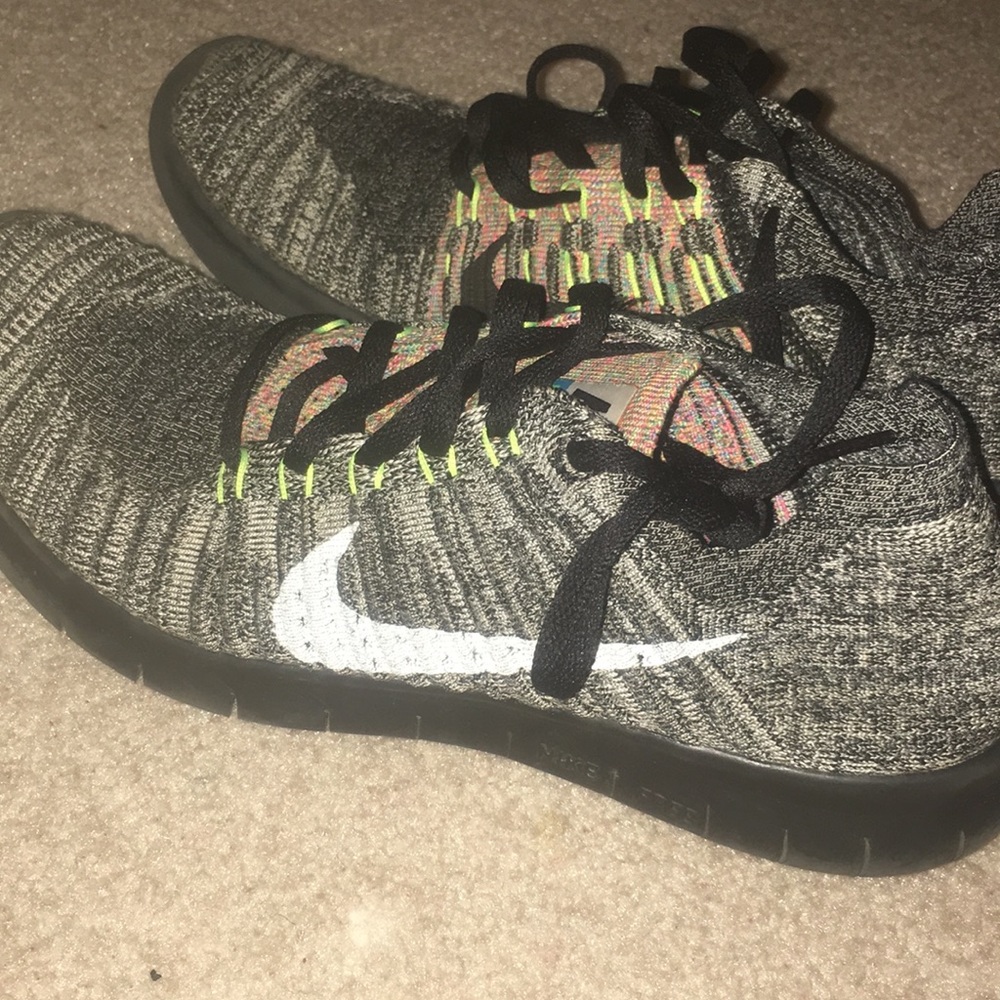 multi color nike free runners