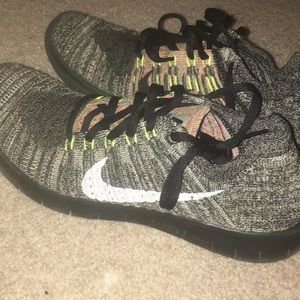 multi color nike free runners