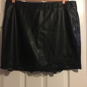 Faux leather mini skirt with crochet trim