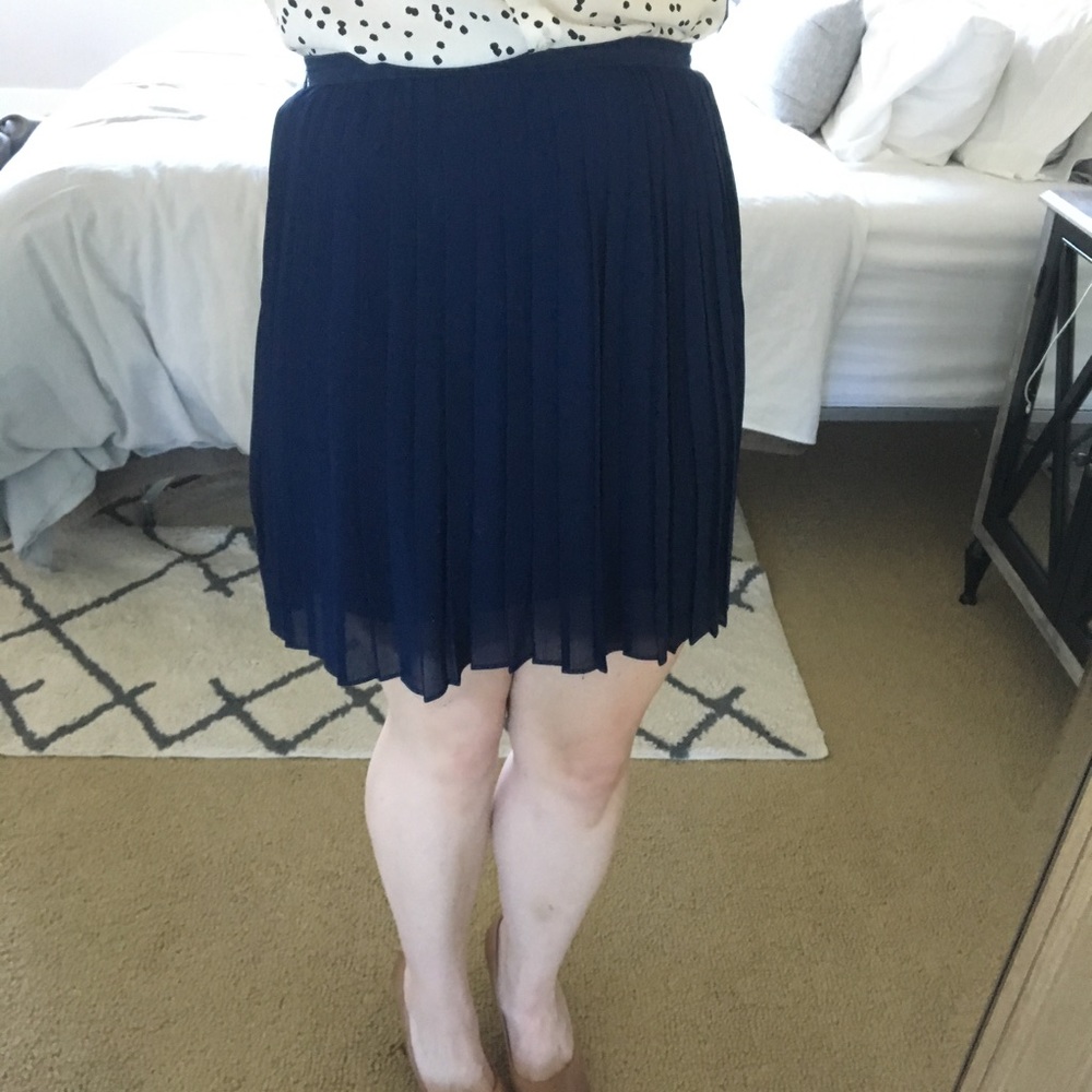 Pleated dark blue skirt