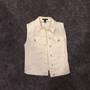 Light cream colored vest.