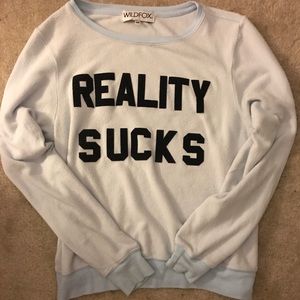 reality sucks sweater