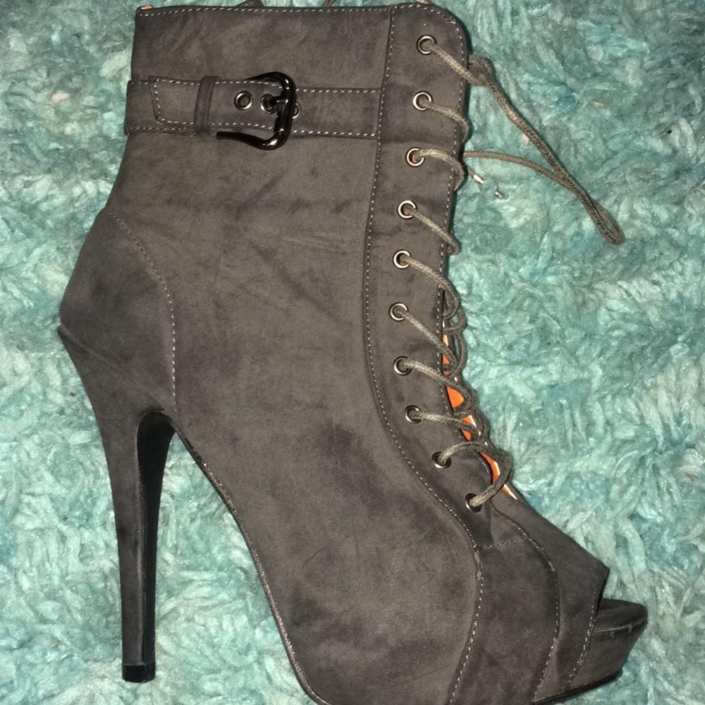 Grey heeled boots. Size 7