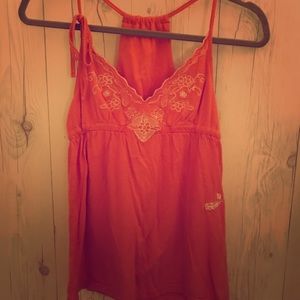 Coral, Volcom tank top.