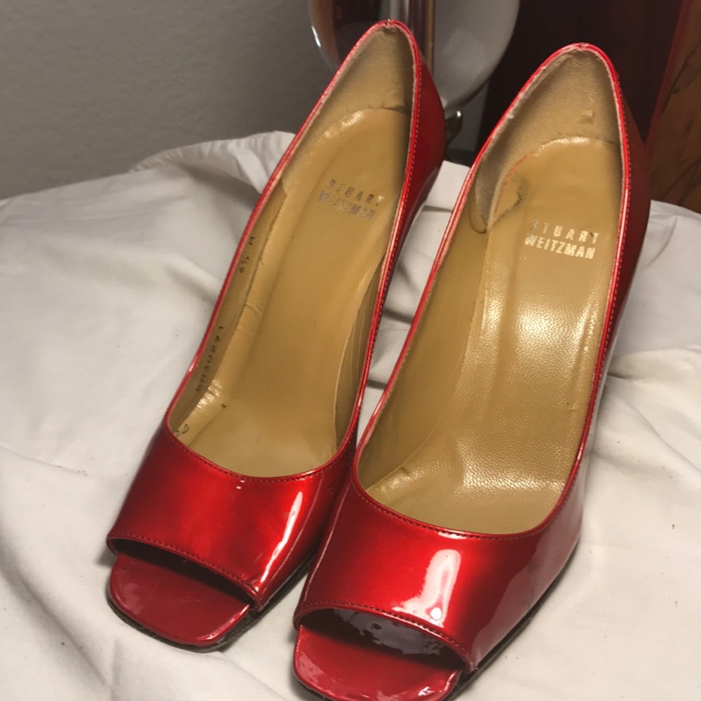 Stuart Weitzman red pattern letter pump.