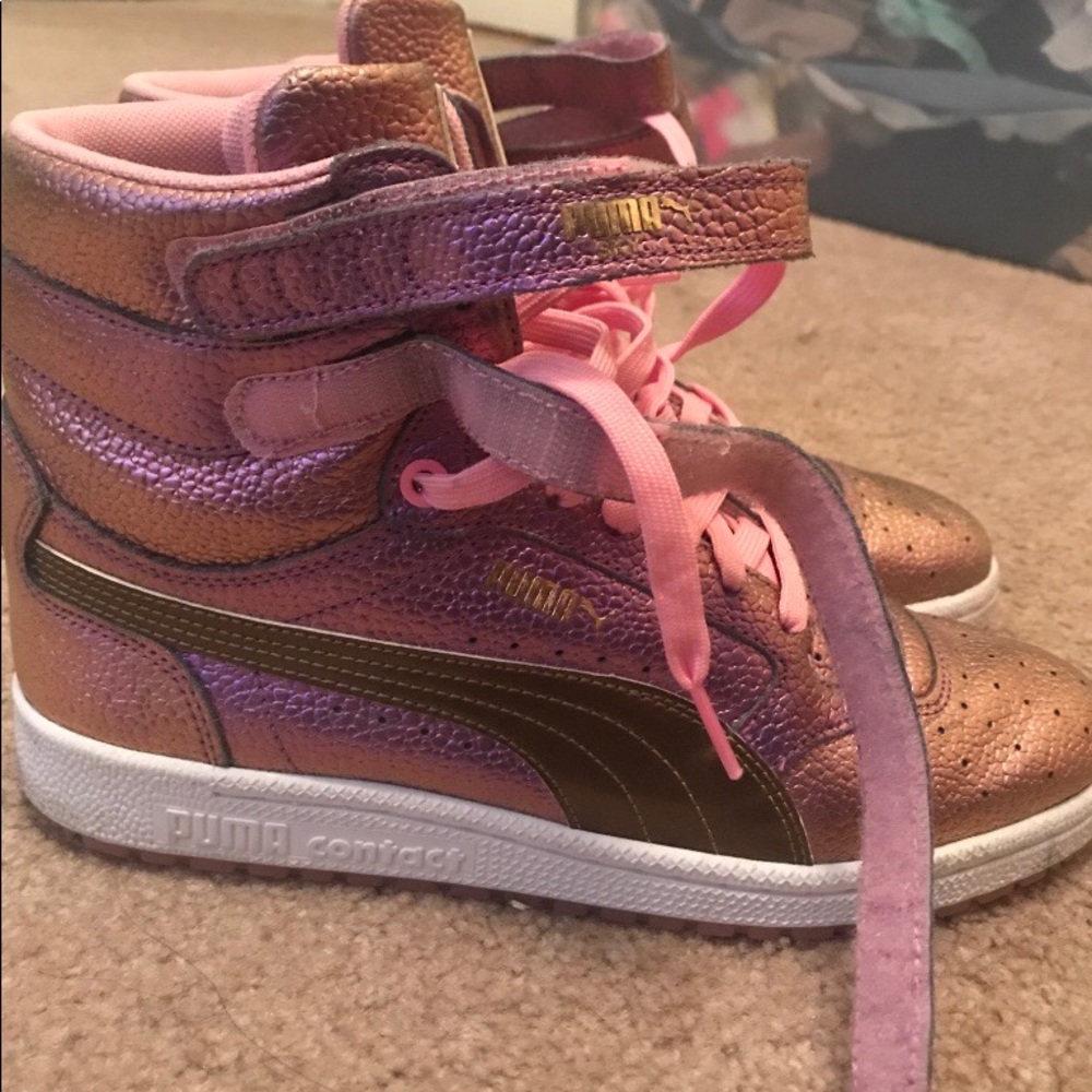 Purple and pink Pumas