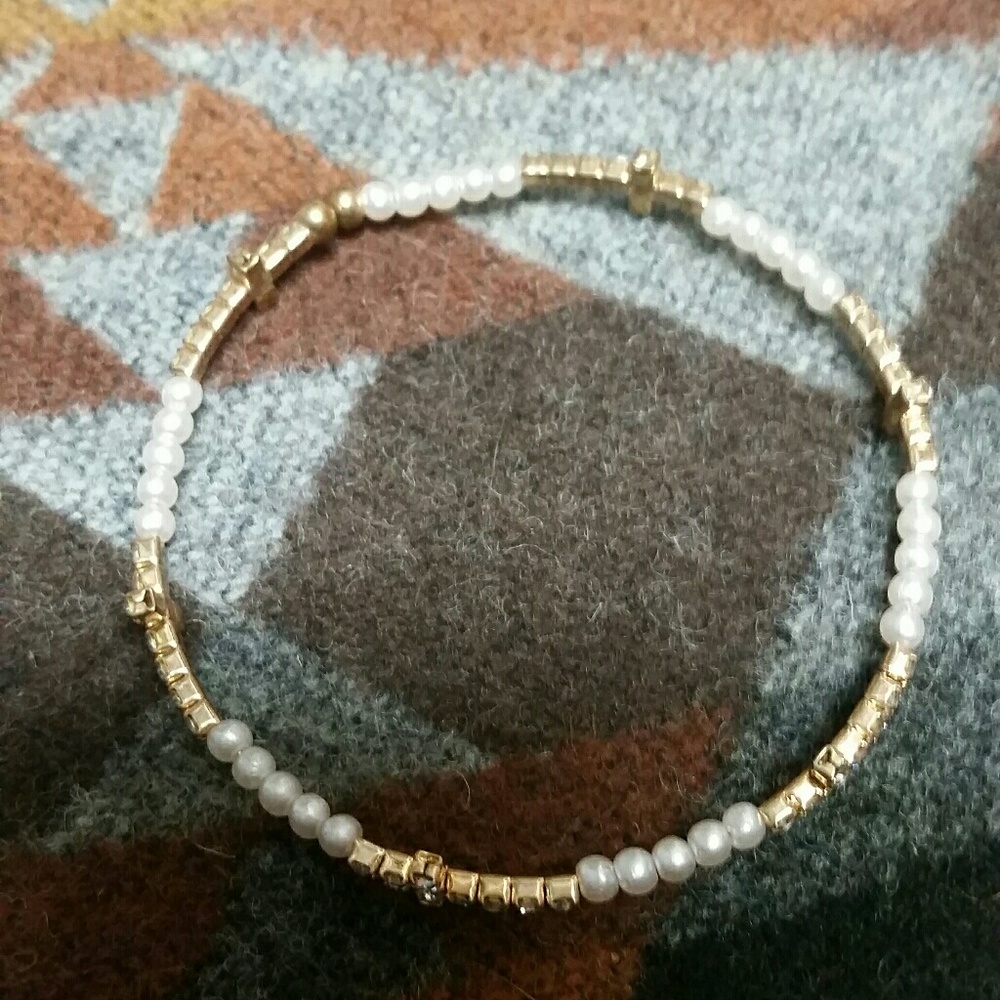 Cross coil bracelet