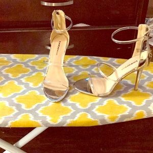 Gold and clear heels