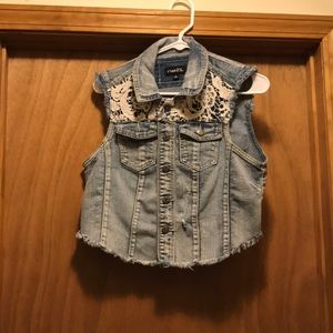 Sleeveless jean jacket, white crochet overlay.