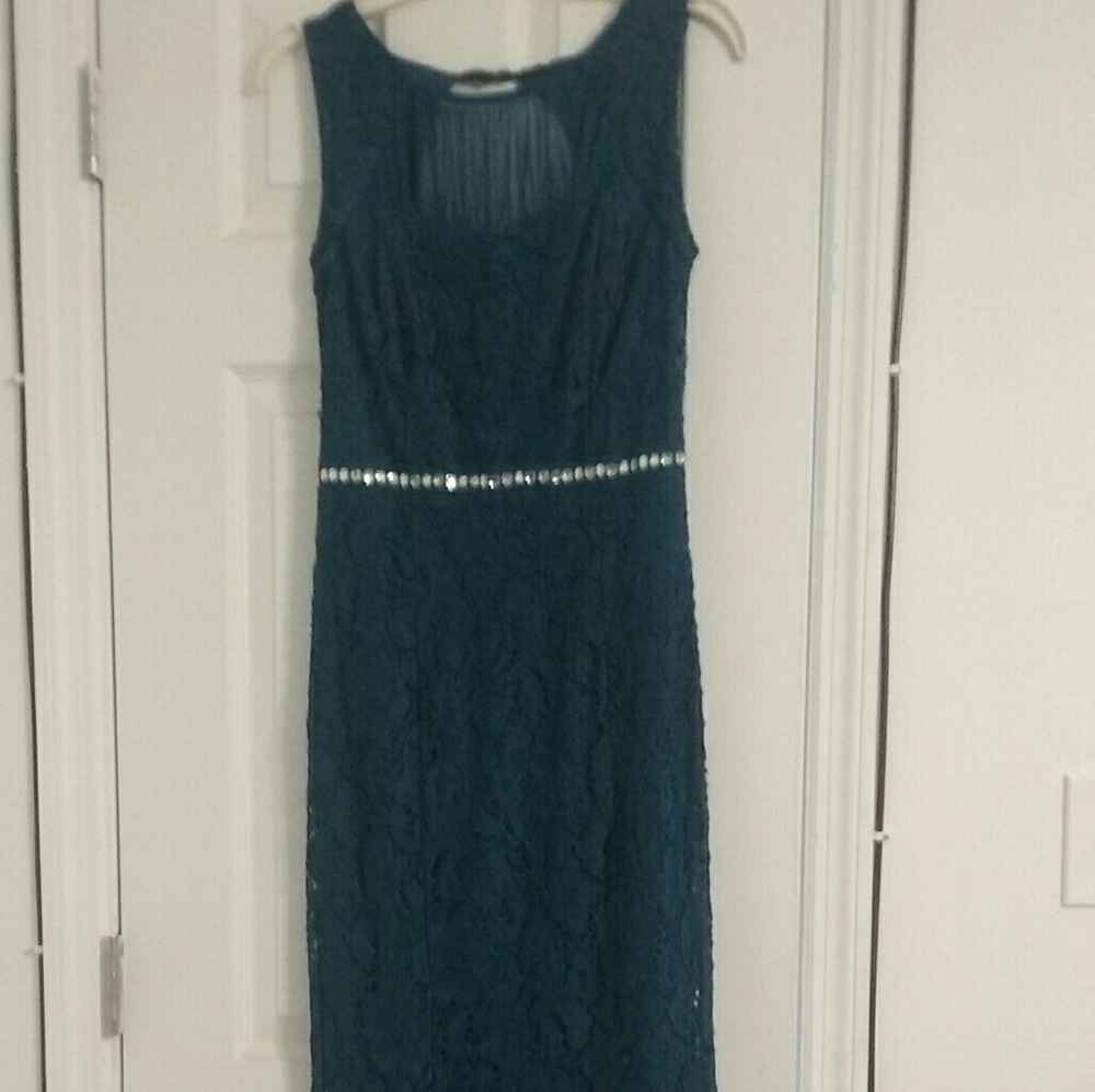 Long teal lace dress with studded belt