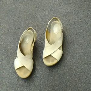 Wedged tan colored shoes