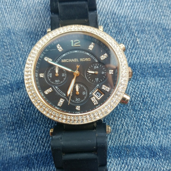 Black and gold mk watch