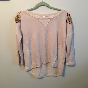Light pink sweat with beaded shoulder details