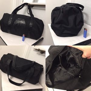 Yves Saint Laurent Bags - Yves Saint Laurent duffle bag with mini pouch Yves Saint Laurent Bags - Yves Saint Laurent duffle bag with mini pouch