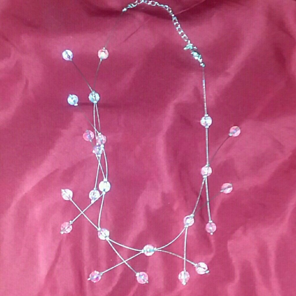 Ensemble illusion rose necklace and earrings
