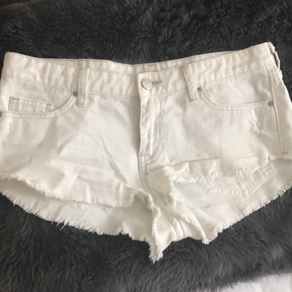 Low rise cut out white denim shorts