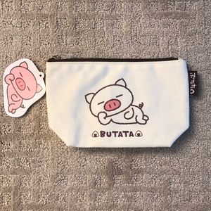 Butata pig cosmetic/travel case.