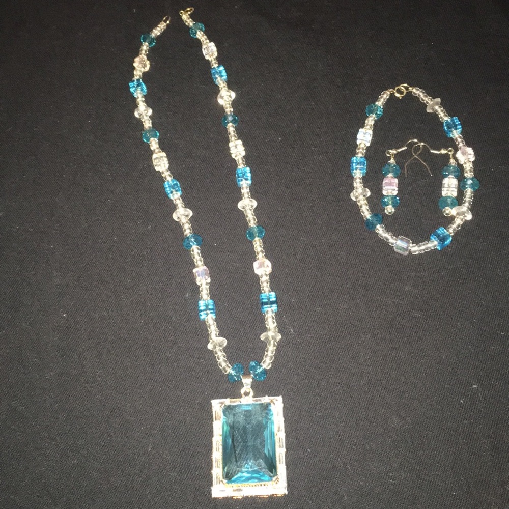 Matching necklace, earrings, and bracelet.