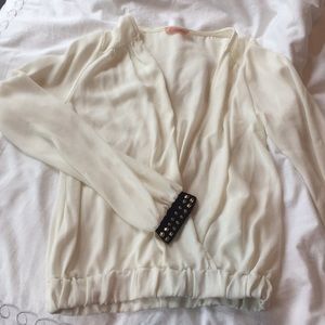 Deep v neck silky top with studded cuff sleeves