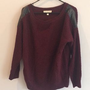 Maroon knit sweater with leather shoulder detail