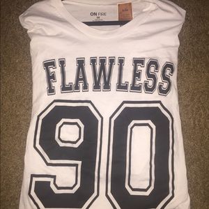Brand New! Never worn Flawless Tshirt (90s babies)