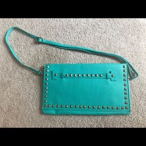 Convertible clutch to shoulder bag